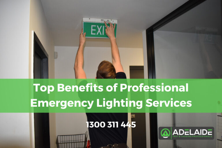 Person installing emergency exit lighting in a commercial setting, emphasizing the importance of professional emergency lighting services for safety compliance.